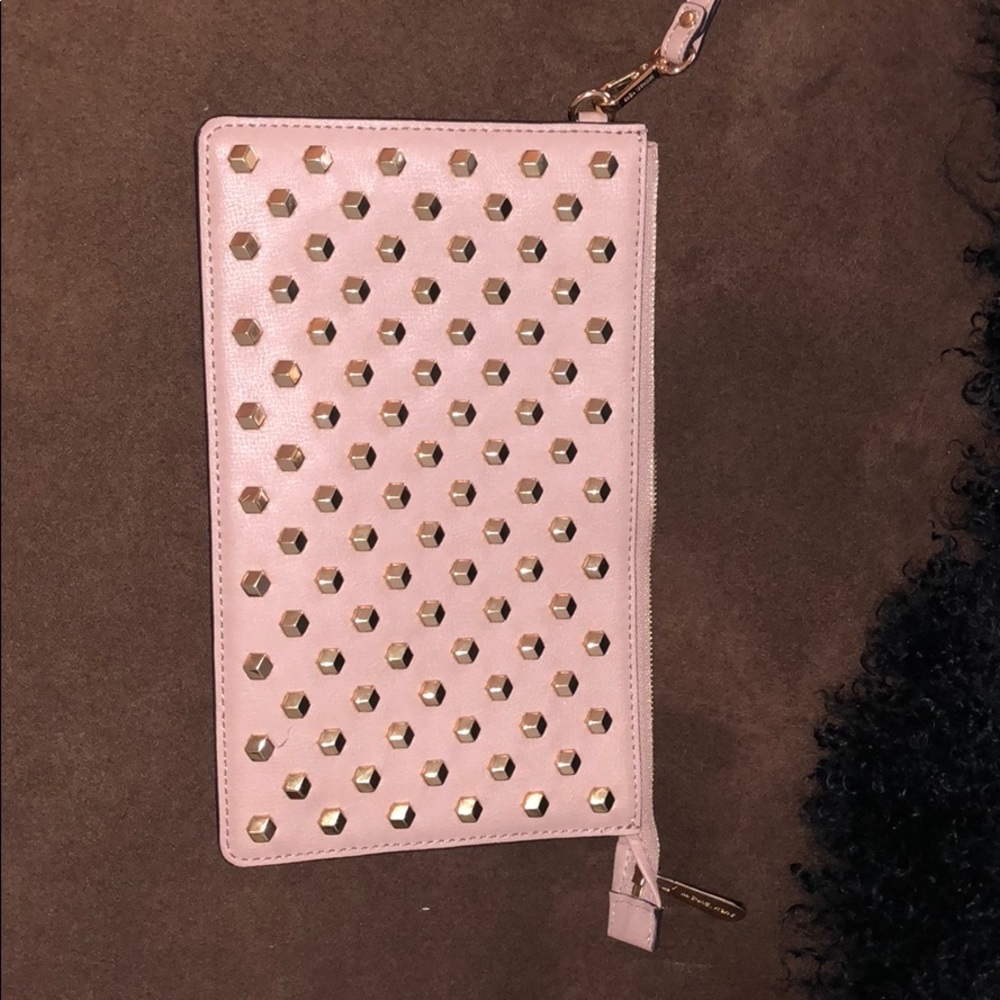 Baby Pink Michael Kors clutch/wristlet with studs